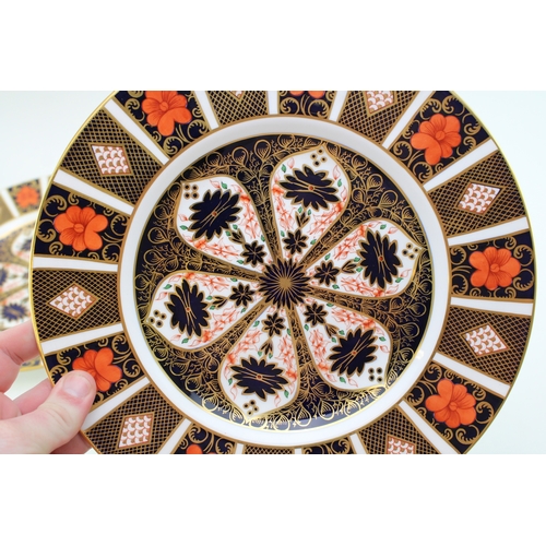 357 - Two Royal Crown Derby 1128 Old Imari dinner plates, 27cm diameter, both firsts.