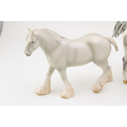 24 - Two John Beswick Horses with an unmarked pottery horse (3).