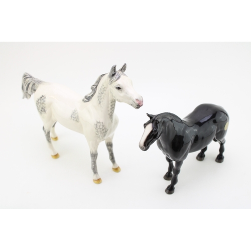 24 - Two John Beswick Horses with an unmarked pottery horse (3).