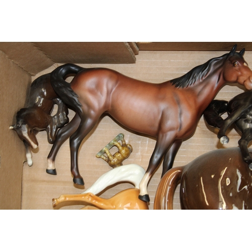 31 - A collection of Beswick and similar horses of varying models and makes (mostly af - collection only.