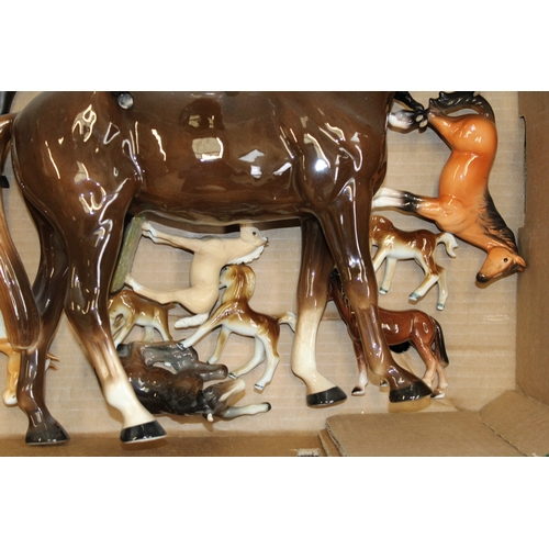 31 - A collection of Beswick and similar horses of varying models and makes (mostly af - collection only.