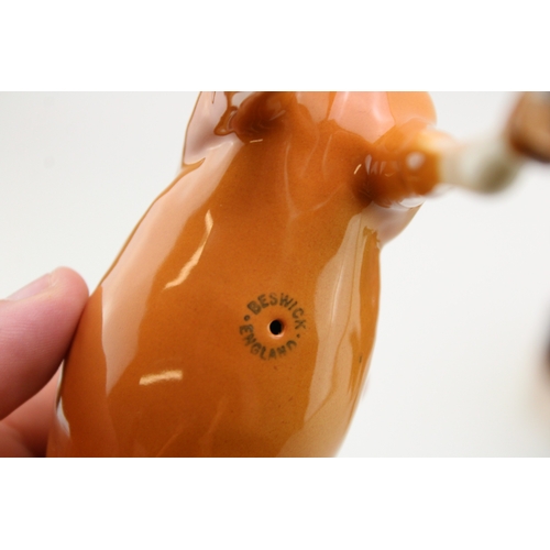 38 - Beswick to include a matt brown shire horse 818, a palomino arab xayal and a Shetland (3).