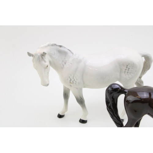 40 - Beswick horses to include a grey mare facing left and brown swishtail with an arab xayal (3).