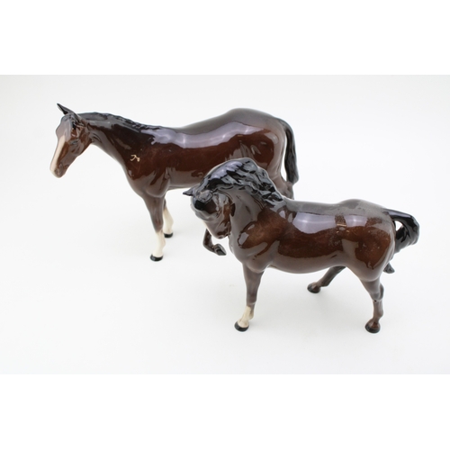 41 - Beswick to include a matt brown quarter horse, a brown bois roussell and a brown head down leg tucke... 
