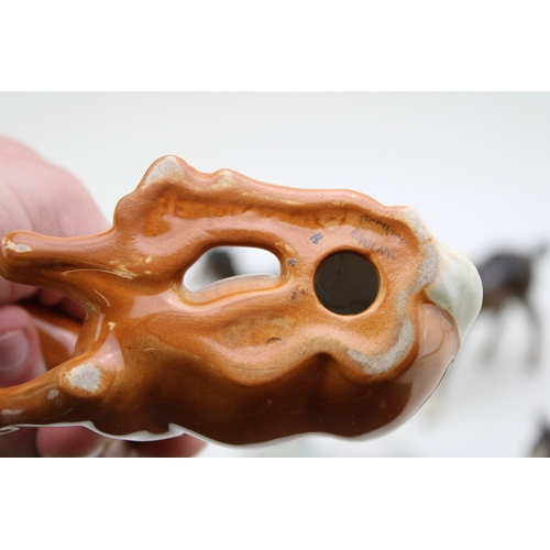 48 - A collection of eight Beswick foals of varying colours and models (8).