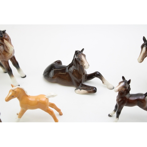 50 - A collection of eight Beswick foals of varying colours and models (8).