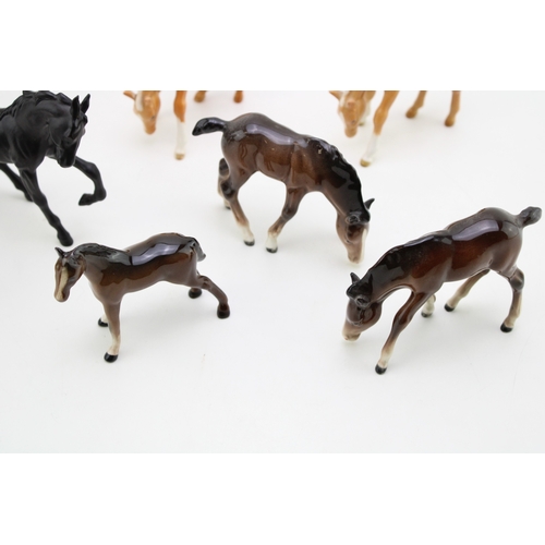 52 - A collection of eight Beswick foals of varying colours and models (8).