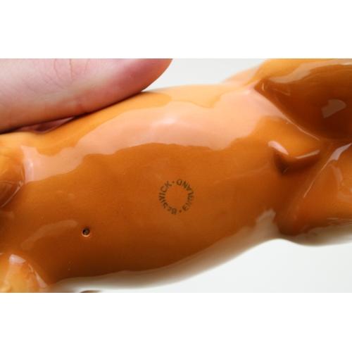 54 - Beswick to include two 1549 leg tucked models in grey and brown with a palomino imperial (3).