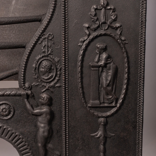 30A - A Georgian cast iron fireplace with ducks nest hob grate, the back plate depicting the Ironbridge in... 
