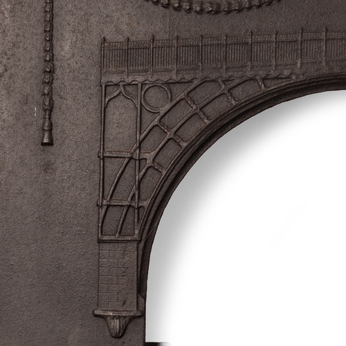 30A - A Georgian cast iron fireplace with ducks nest hob grate, the back plate depicting the Ironbridge in... 