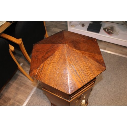 1 - An early 20th century oak country house postbox or letterbox, with later applied brass plaque, hexag... 