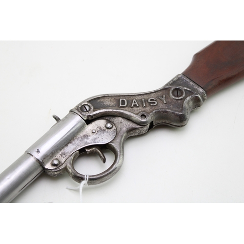 11 - An early 20th century Daisy '20th Century Daisy' air rifle maker marked to the stock 'Daisy Manfg Co... 