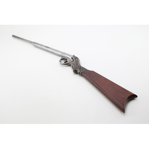 11 - An early 20th century Daisy '20th Century Daisy' air rifle maker marked to the stock 'Daisy Manfg Co... 