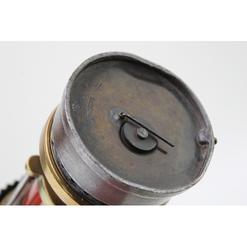19 - A WWII ere Miners lamp, Patterson of Felling H.C.P, patent two with red glass, 31cm tall.