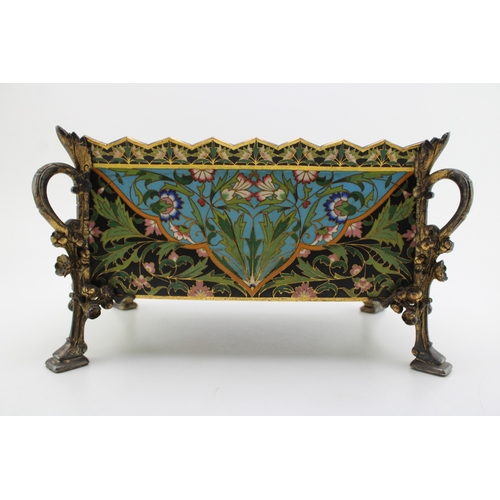 3 - An Elkington & Co cloisonne enamel planter with metal liner, raised on four feet with floral decorat... 