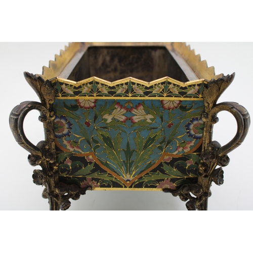 3 - An Elkington & Co cloisonne enamel planter with metal liner, raised on four feet with floral decorat... 