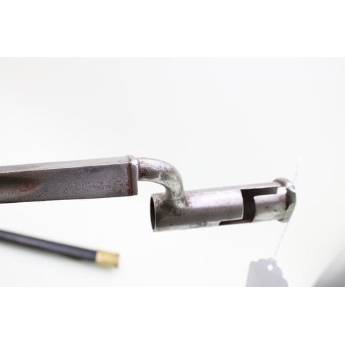 32 - A replica of a 19th century socket bayonet in a leather scabbard