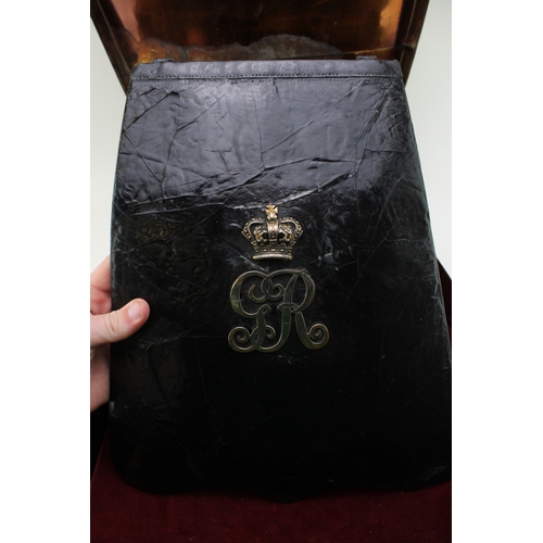 38 - A Georgian Napoleonic War era Cavalry black leather Sabretache bag with GR cypher & Crown contained ... 