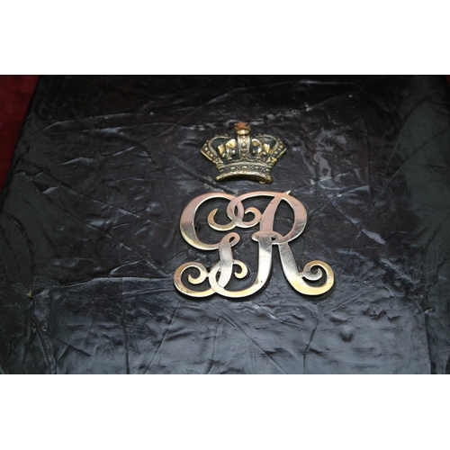 38 - A Georgian Napoleonic War era Cavalry black leather Sabretache bag with GR cypher & Crown contained ... 