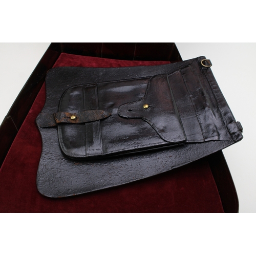 38 - A Georgian Napoleonic War era Cavalry black leather Sabretache bag with GR cypher & Crown contained ... 