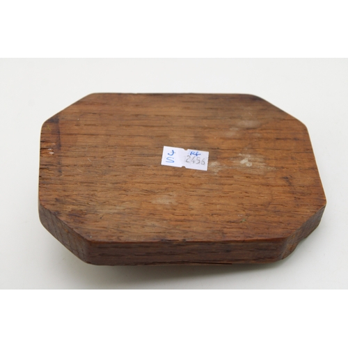 41 - Workshop of Robert 'Mouseman' Thompson of Kilburn Yorkshire, a carved oak ashtray with carved mouse ... 