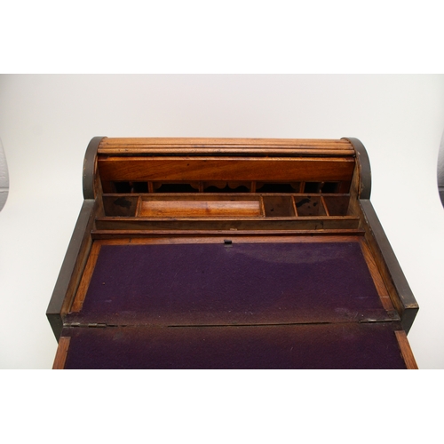 43 - A campaign camphor metamorphic lap desk, brass bound, the interior fitted with compartments, 46.5cm ... 