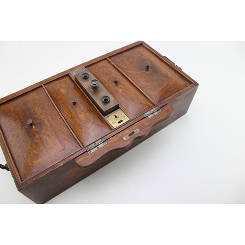 44 - An early 20th century cigar or cigarette oak locking humidor by Hallstaff & Hannaford 223 Regent Str... 