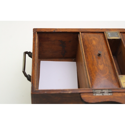 44 - An early 20th century cigar or cigarette oak locking humidor by Hallstaff & Hannaford 223 Regent Str... 