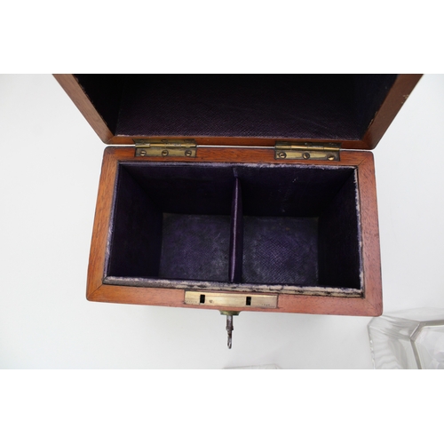 45 - A Victorian oak decanter box with brass banding, containing two cut glass decanter bottles, purple l... 
