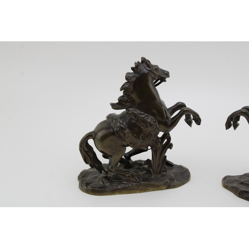 9 - A pair of 19th century bronzed spelter figures 'Horse Restrained by a Groom', modelled after the fam... 