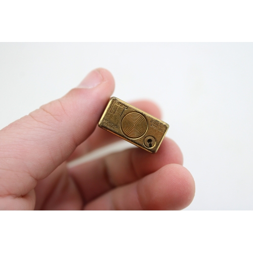 10 - A Dunhill lighter, with transfer brown marble effect pattern, in original box, with original package... 