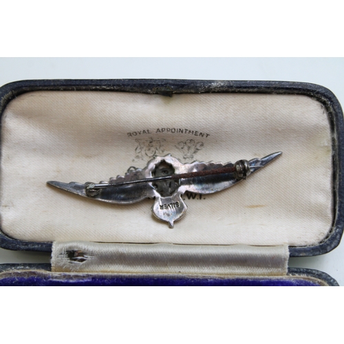 258 - A silver and enamel RAF sweetheart brooch, with pale blue enamel wings, red crown and green laurel l... 