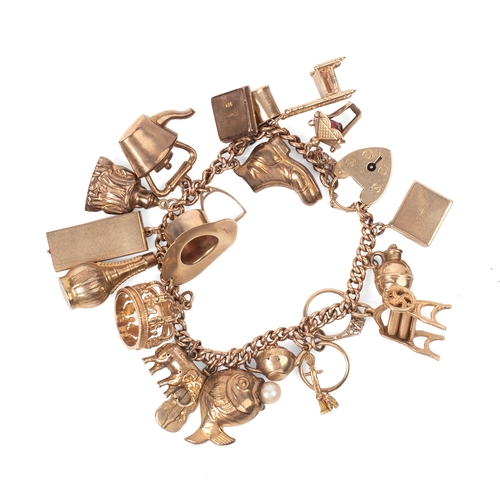 A 9ct gold curb link charm bracelet with twenty one charms, all individually hallmarked, including fish with pearl, top hat, mangle, elephant and crown, with heart shaped padlock clasp, total weight 39.1g.