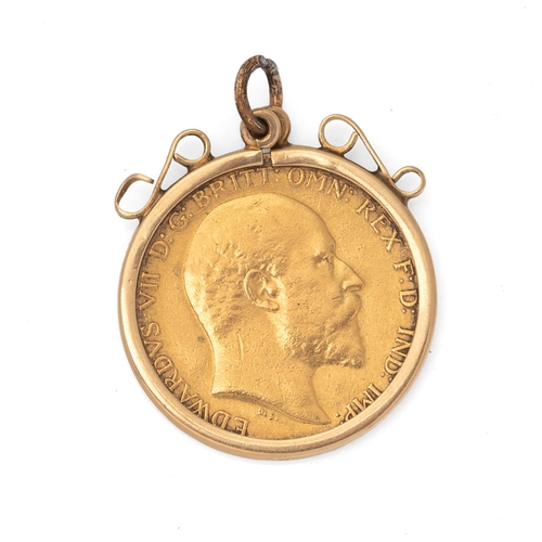 6 - An Edward VII gold half sovereign, 1905, in 9ct gold mount, total weight 4.5g.