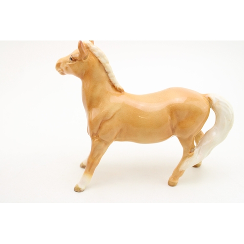 301 - Beswick Girl's Pony 14783 in scarce palomino colourway.