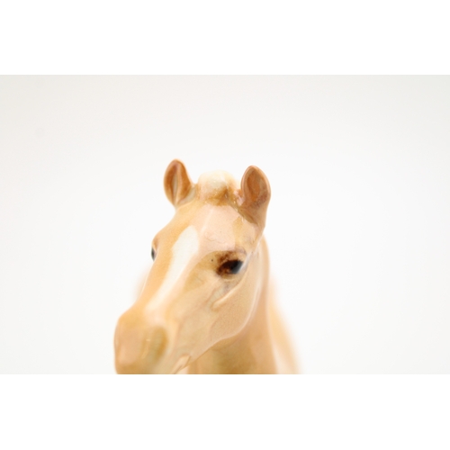 301 - Beswick Girl's Pony 14783 in scarce palomino colourway.