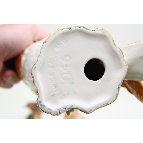 309 - Beswick birds to include a large barn owl, a smaller barn owl, a whitethroat, a robin and a goldcres... 