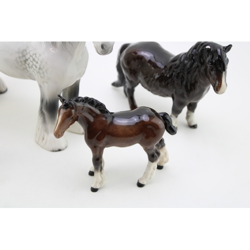 312 - Beswick horses to include a grey shire horse, a large shire foal in brown and others (Qty).
