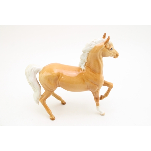 316 - Beswick palomino prancing Arab.