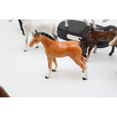 332 - A collection of Beswick foals (7).