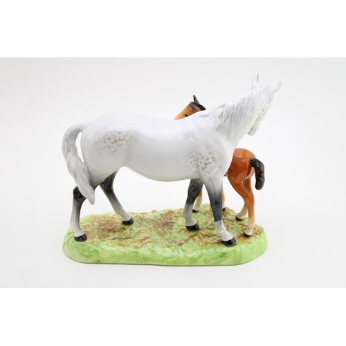 326 - Beswick Grey Mare and Chesnut Foal on ceramic base.