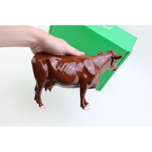 328 - Boxed Beswick Red Poll cow.