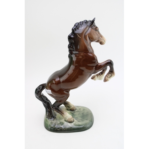 329 - A Beswick 'Rearing Welsh Cob' model 1014, 16.5cm tall.