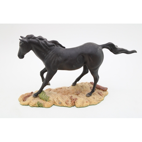 337 - Royal Doulton horse on resin base.