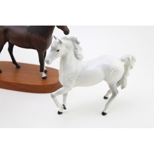 339 - Beswick to include a grey prancing arab, a matte brown arab xayal and a palomino huntsman's horse (3... 