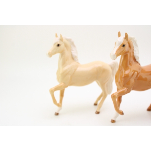 340 - Beswick prancing arabs to include a light palomino colourway, a darker palomino colourway and a brow... 