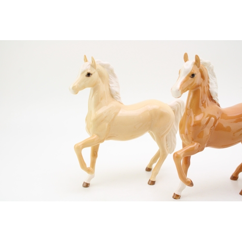 340 - Beswick prancing arabs to include a light palomino colourway, a darker palomino colourway and a brow... 