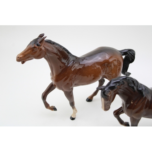 346 - Beswick brown stocky jogging mare with a huntsman's horse and one other (3).