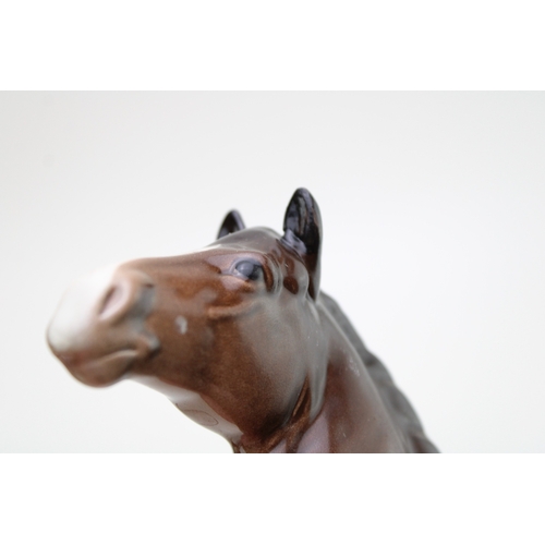 352 - Beswick walking racehorse and jockey with a brown Welsh cob (2 - both af).