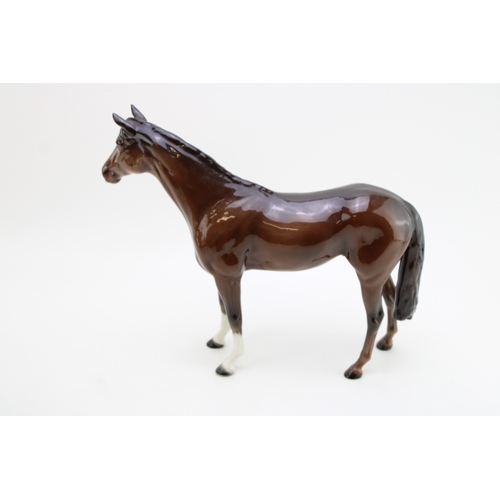 355 - Beswick large brown hunter.